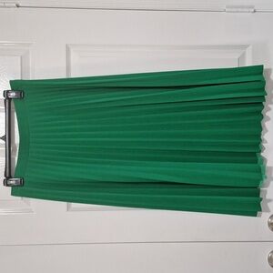 Green pleated skirt